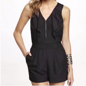 NWOT black ruffled, zip front Express romper